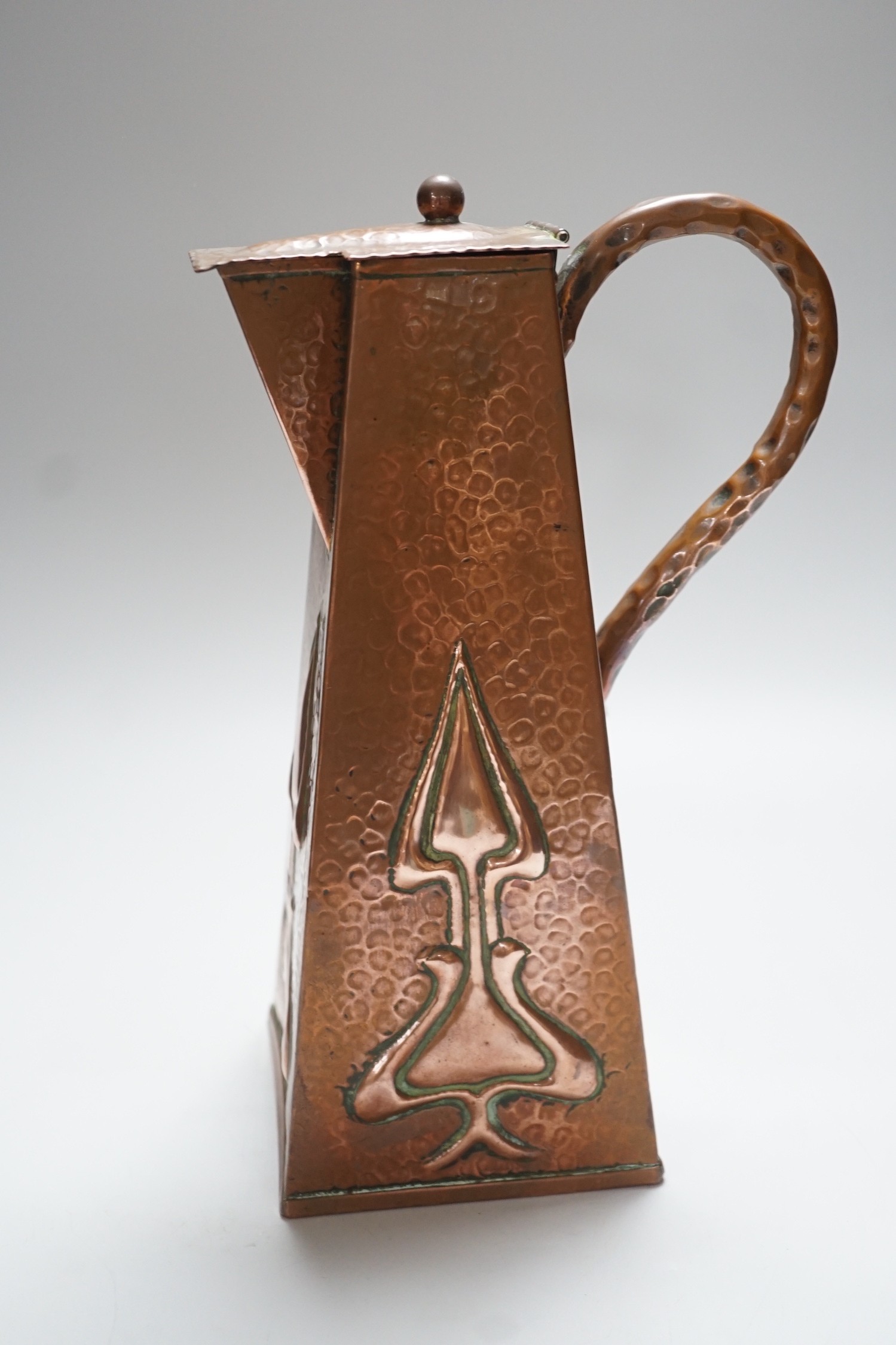 A hammered copper Art Nouveau coffee pot, 29cms high